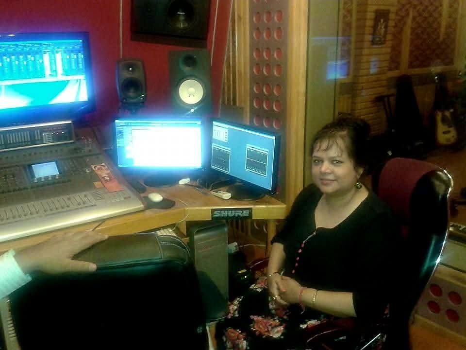 Banasri Ghoshal at the mixing console during a recording session